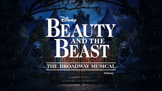 A curtain warmer of castle gates with the Disney's Beauty and the Beast logo