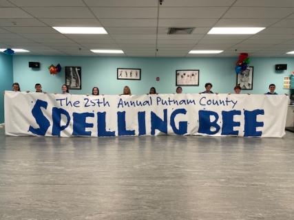 30 foot long vinyl banner.  Has grommets for easy hanging.  Filled up the stage beautifully so that other banners weren't needed.  Easy to mail. 