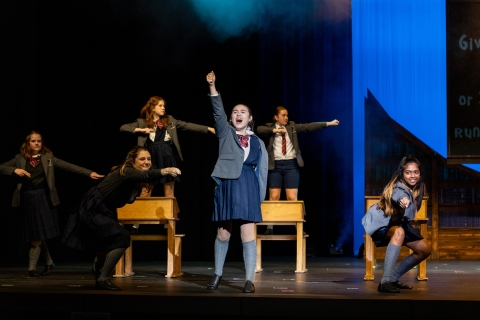 Matilda Uniforms Cast members singing Revolting Children